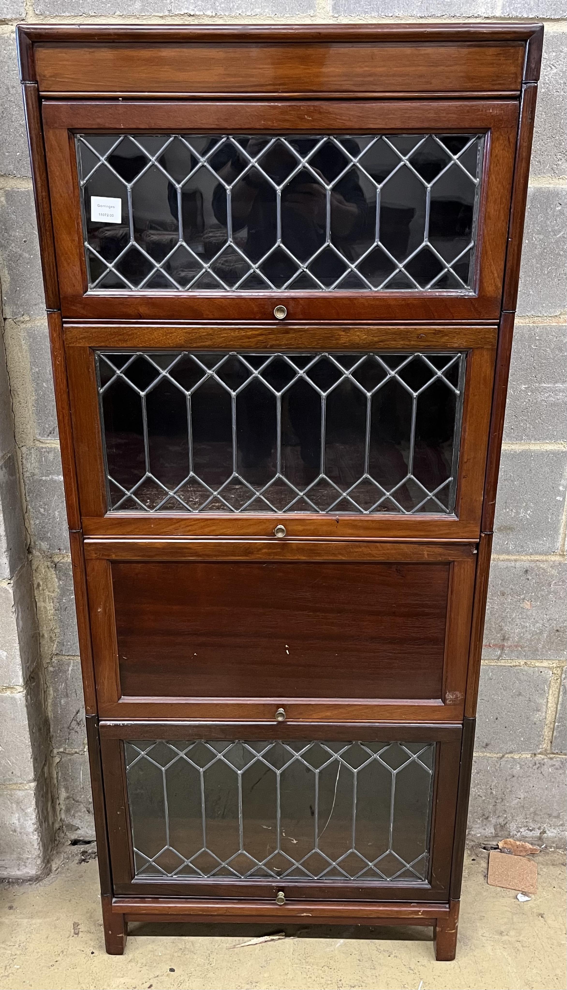 A narrow Globe Wernicke style mahogany four section bookcase, width 66cm, depth 31cm, height 156cm